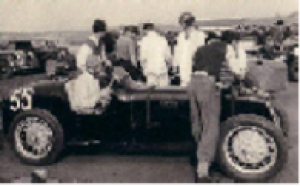 In his first proper racing car an MG Magnette