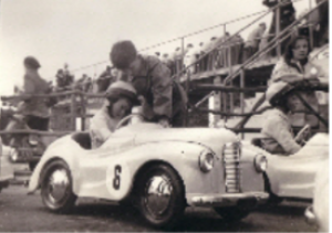 Aged about 7 his first actual race at Silverstone. A pedal car race for children of racing drivers (he came third)